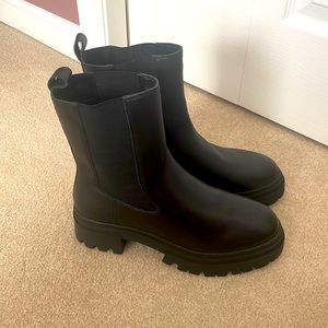 Never worn black leather pull on ankle boots